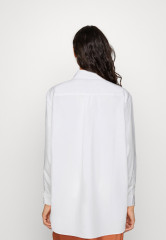 Tommy Hilfiger 1985 ORG CO POPLIN Button-down blouse optic white 1985 ORG CO POPLIN Блуза на пуговицах оптический белый