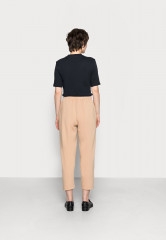 Tommy Hilfiger RELAXED LONG PANT Tracksuit bottoms beige RELAXED LONG PANT Спортивные штаны бежевый