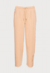 Tommy Hilfiger RELAXED LONG PANT Tracksuit bottoms beige RELAXED LONG PANT Спортивные штаны бежевый
