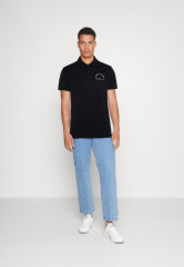 Tommy Hilfiger SHADOW UNISEX Polo shirt desert sky SHADOW UNISEX Рубашка поло небо пустыни